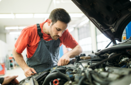 Man working on a car.