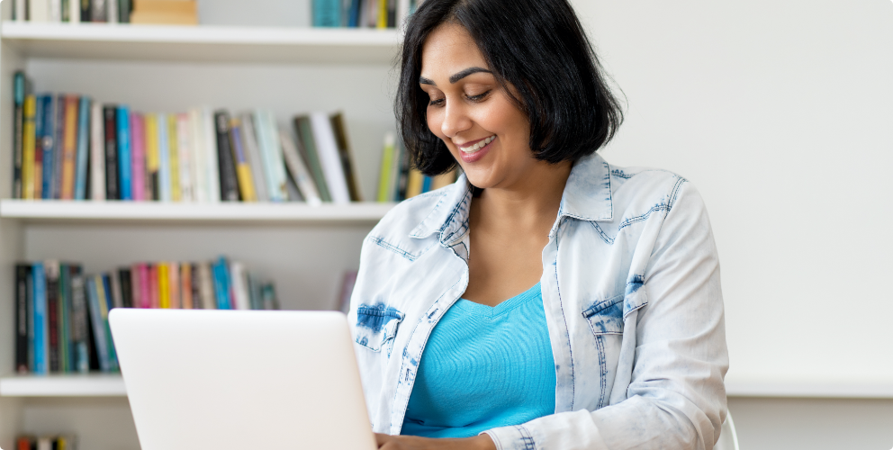 Image of a woman with a computer.