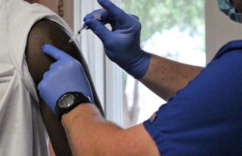 Person receiving vaccine